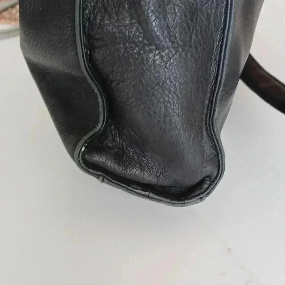 Rolf's Black leather shoulder bag with pockets